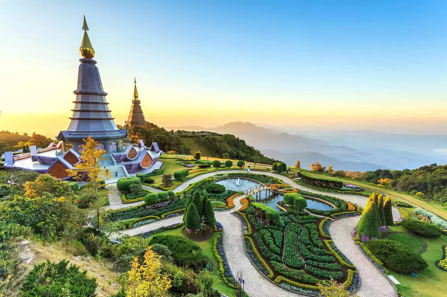 The Royal Twin Pagodas on Doi Inthanon mountain in Chiang Mai at sunset.
