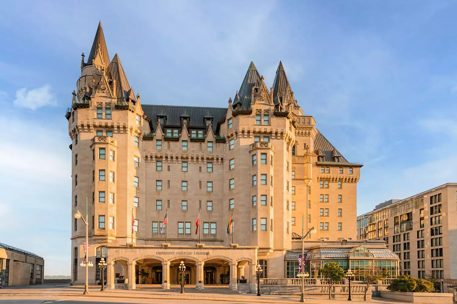 Exterior of the Fairmont Château Laurier in Ottawa against a clear sky.