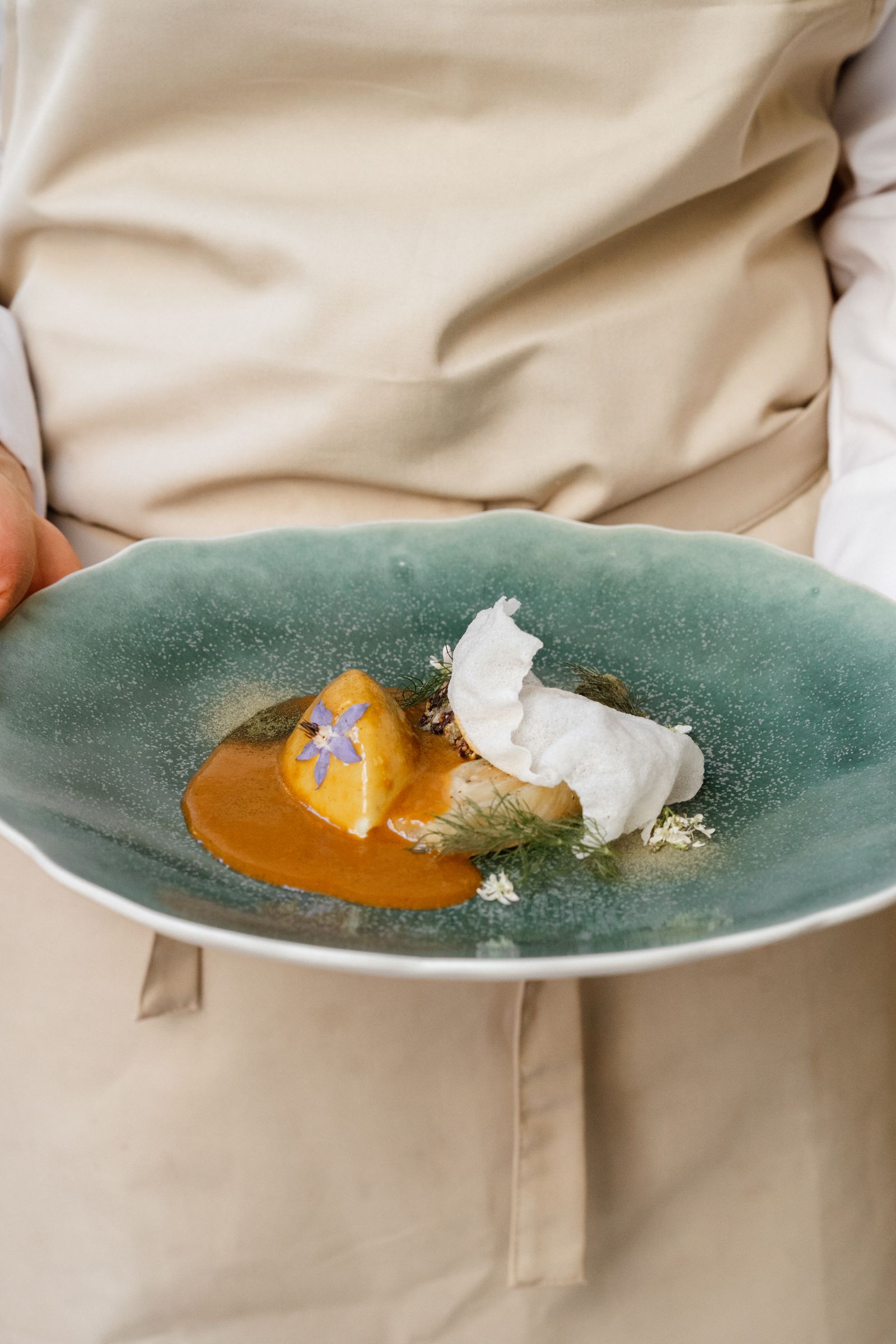 A perfectly plated gourmet egg dish in a fine dining restaurant.