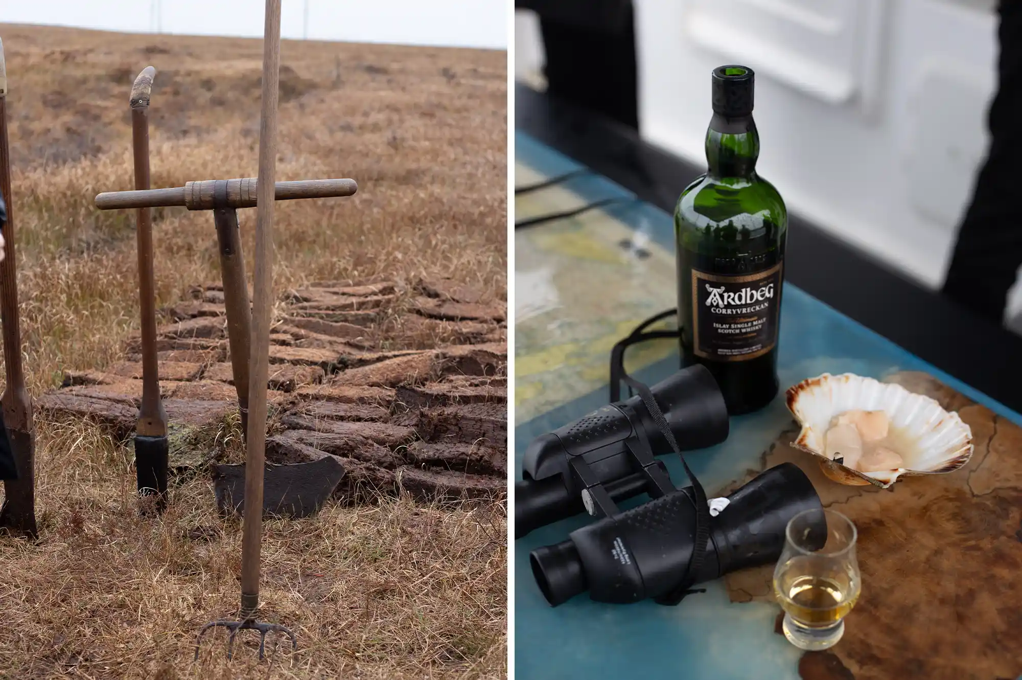 A bottle of Ardbeg whisky on a wooden table next to binoculars and a glass, with a peat-cutting field in the background.