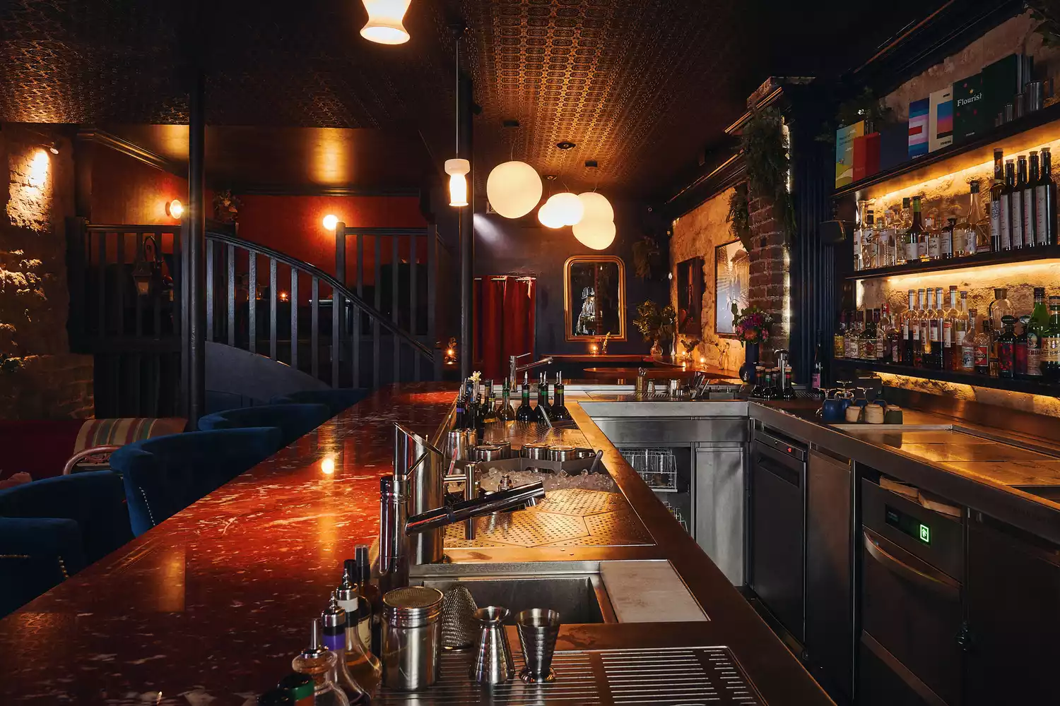 The moody, stylish interior of the renowned Little Red Door cocktail bar in the Marais.