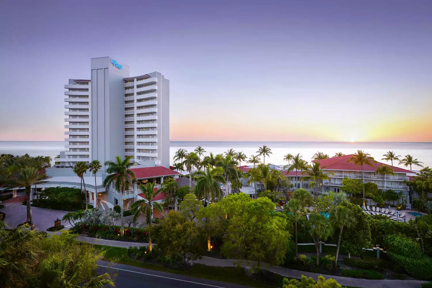 Exterior resort view of LaPlaya Beach & Golf Resort in Naples.