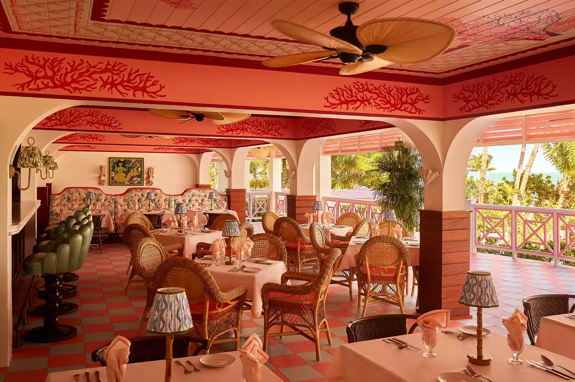 The interior of Pink Mermaid restaurant with focus on the unique architectural shell details.