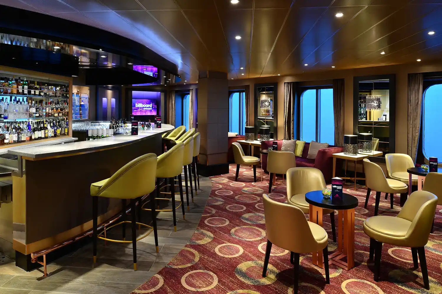 The Billboard Onboard and Casino Bar area with social seating and modern decor.