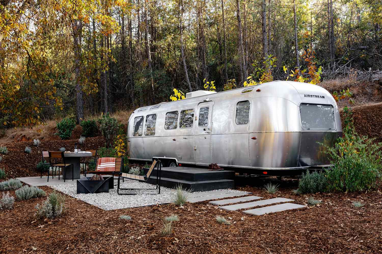 A wide-angle scenic view of AutoCamp Asheville's landscape and accommodations.