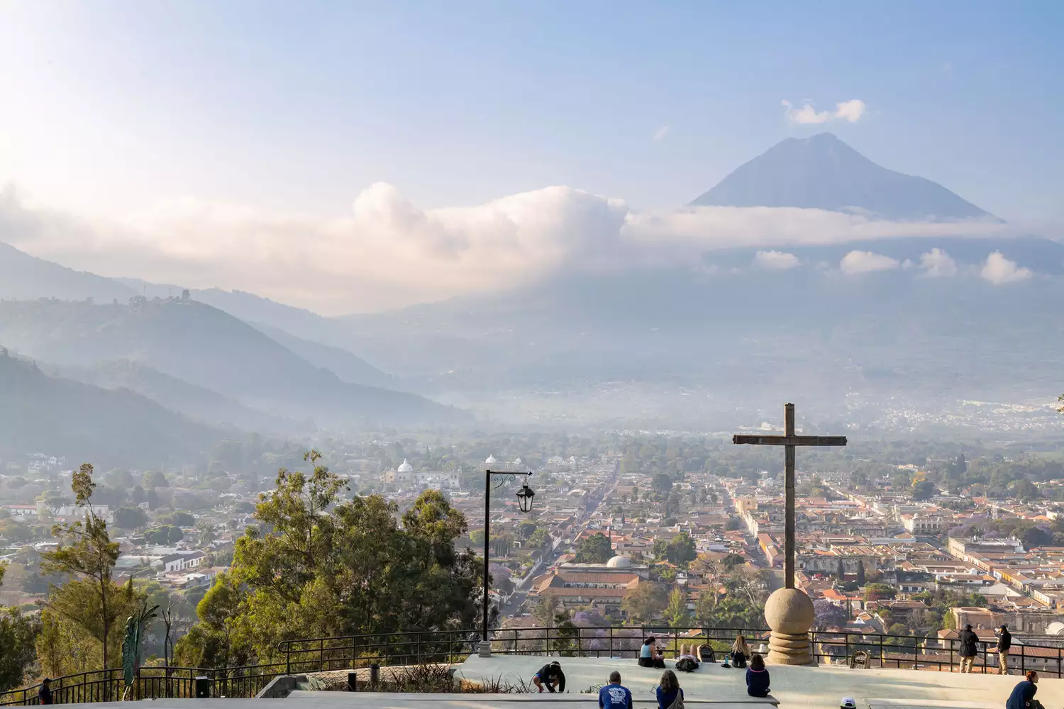 View over Antigua Guatemala with volcanic peaks in the distance