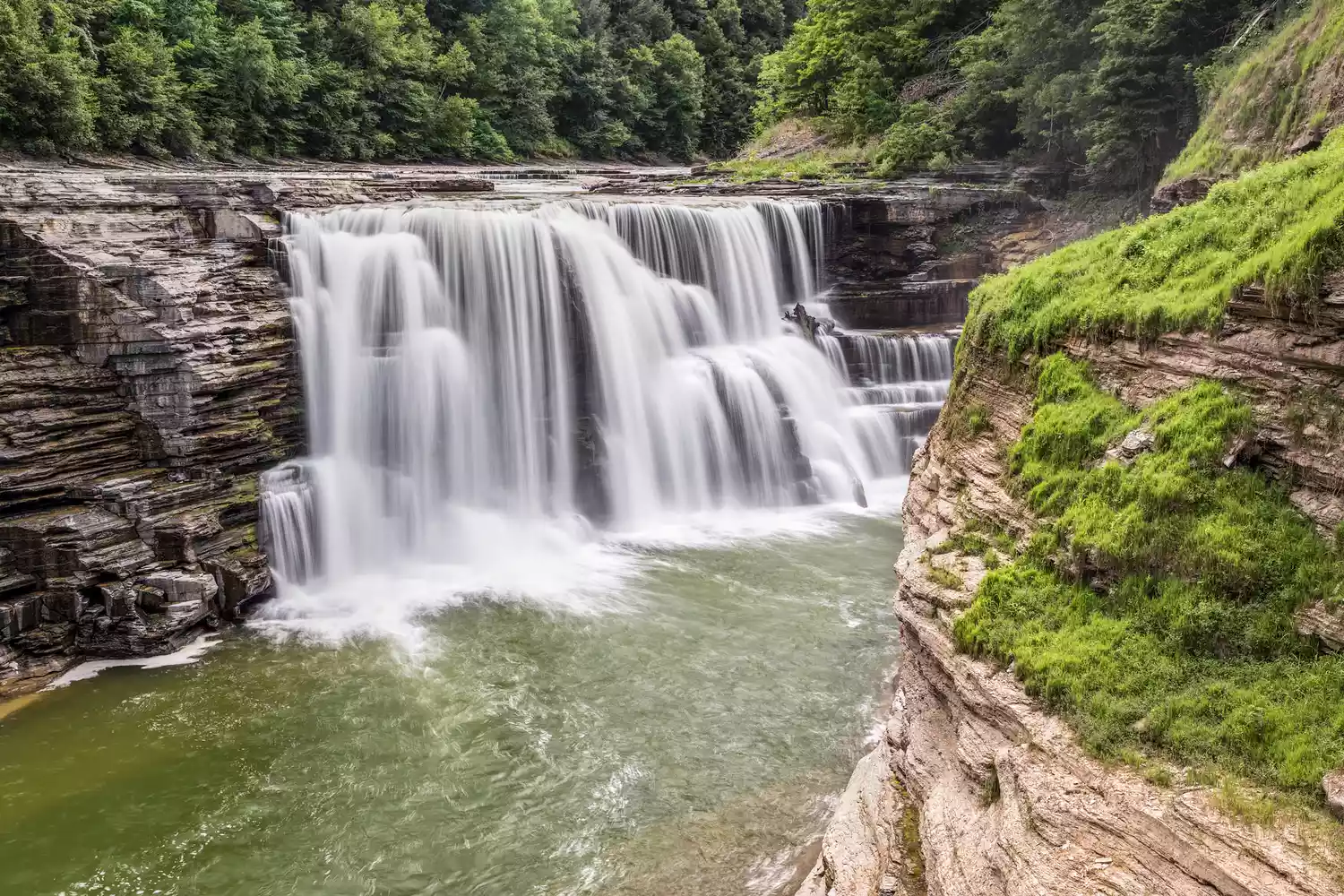 Whitewater rushing over the Lower Falls at Letchworth State Park.
