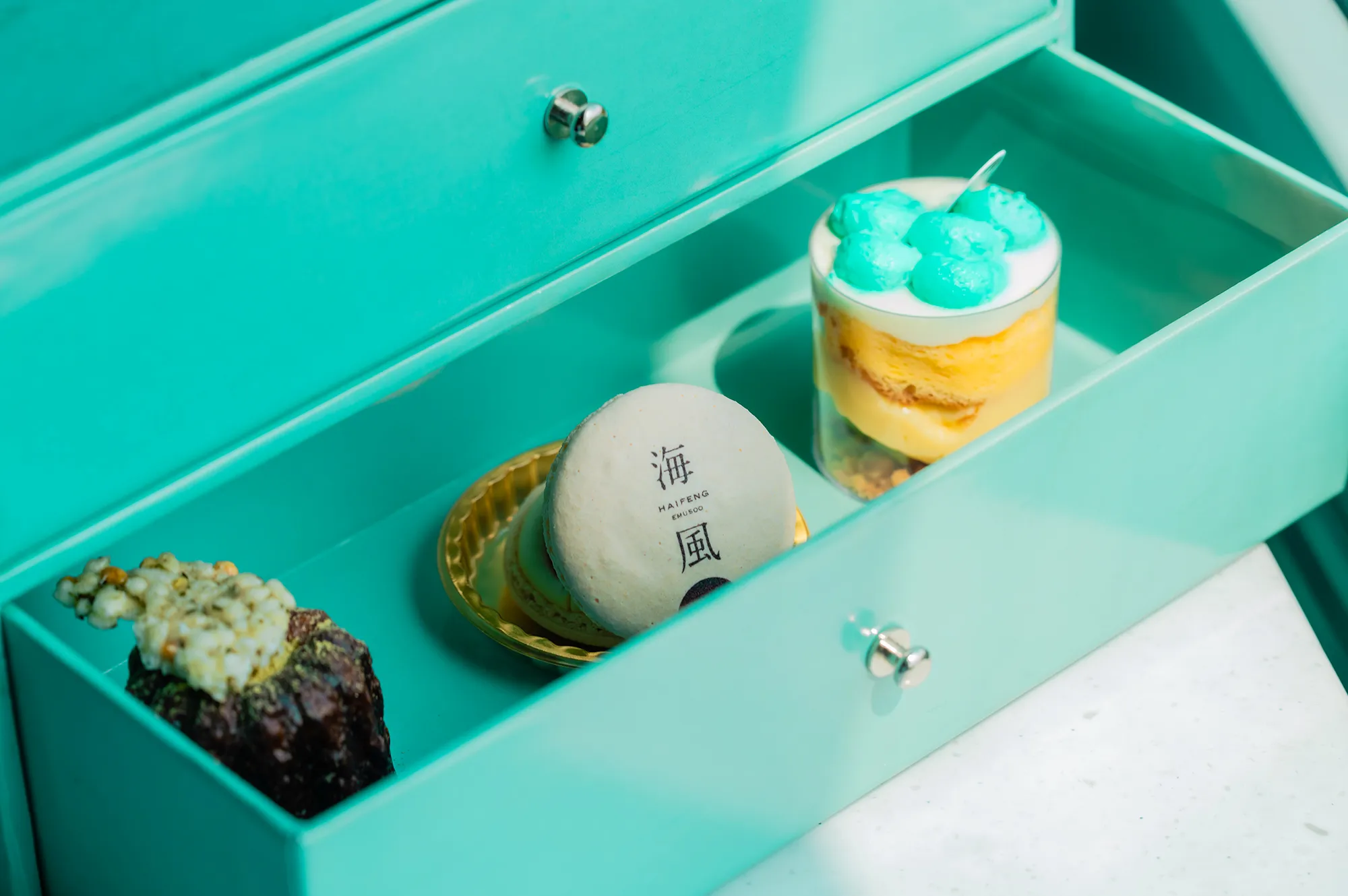 Artfully plated Michelin-starred desserts served on the Haifeng luxury train.