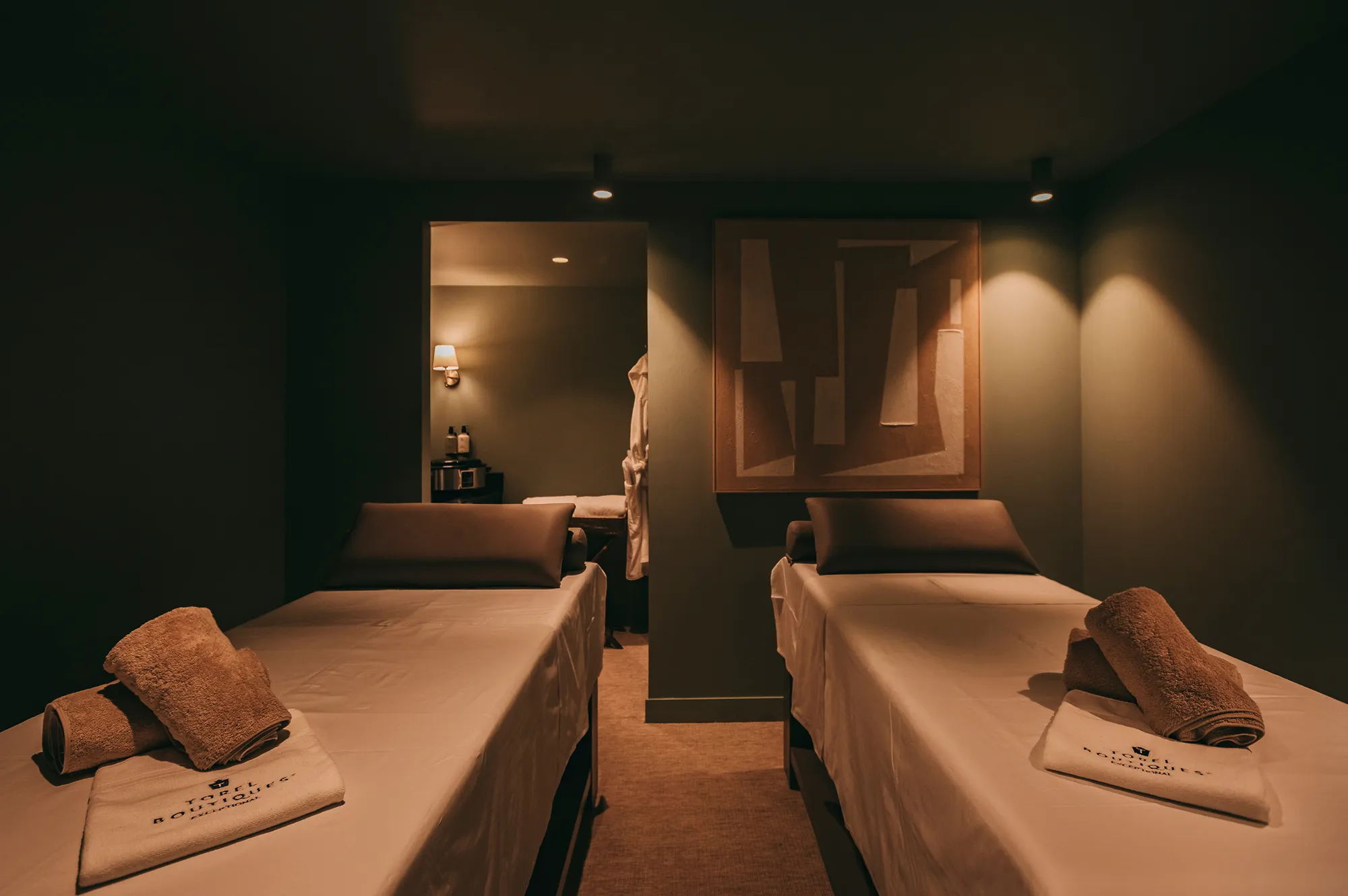 The Calla Wellness and Spa massage room with two professional massage beds.