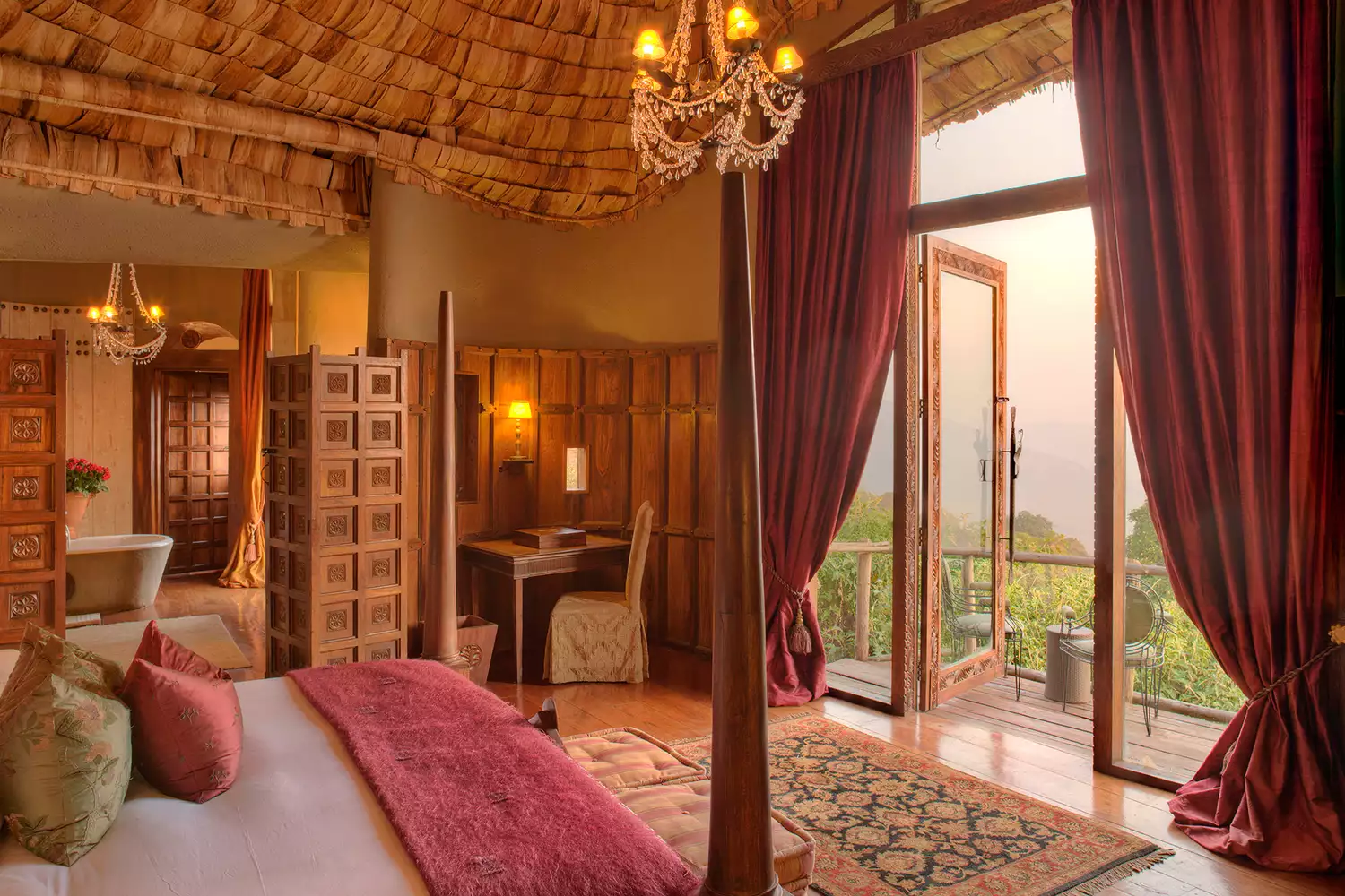 View of the green hills and the Ngorongoro Crater from the balcony of a guest suite.