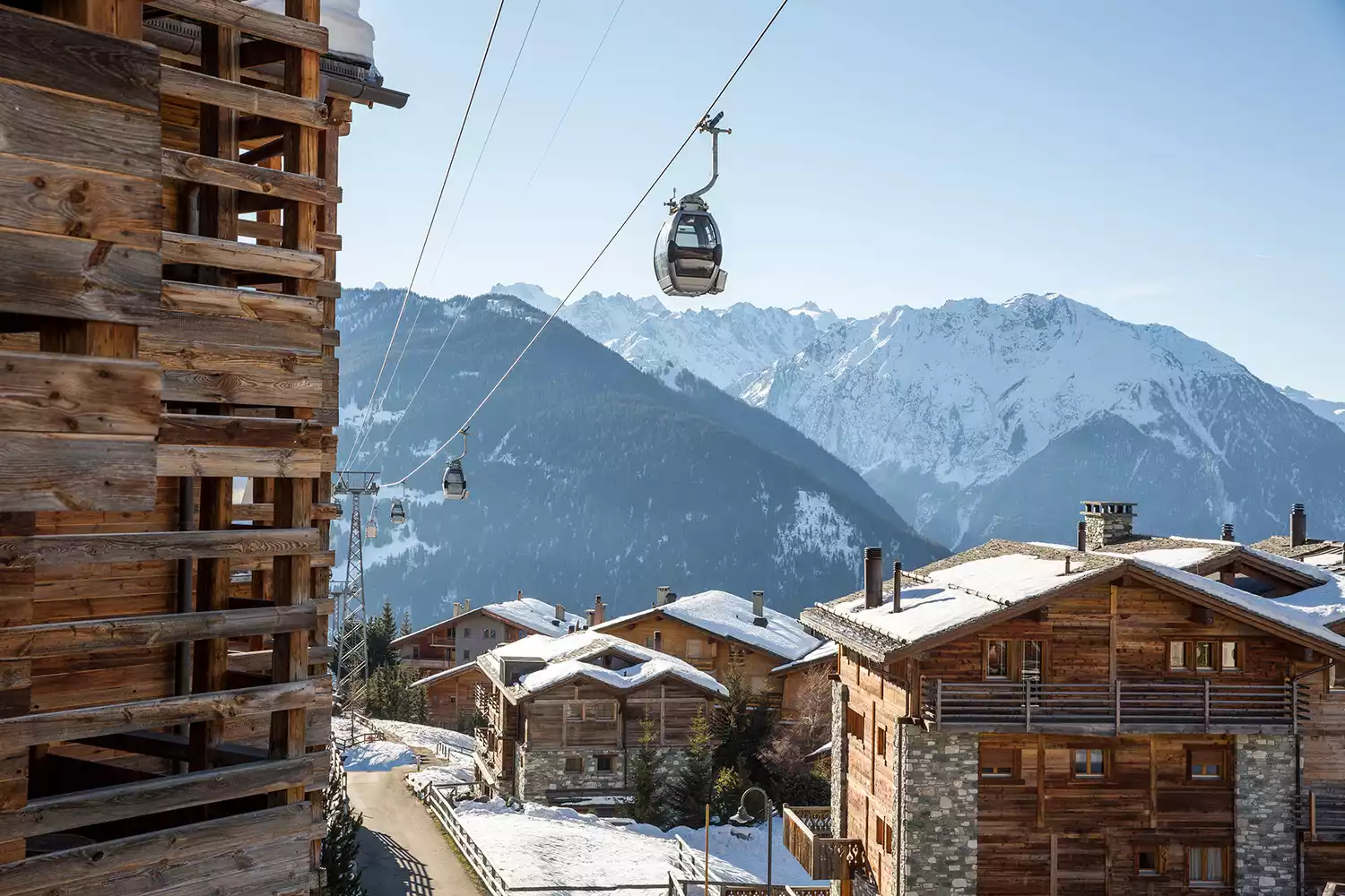 Modern ski lifts and gondolas operating at the Verbier alpine village.