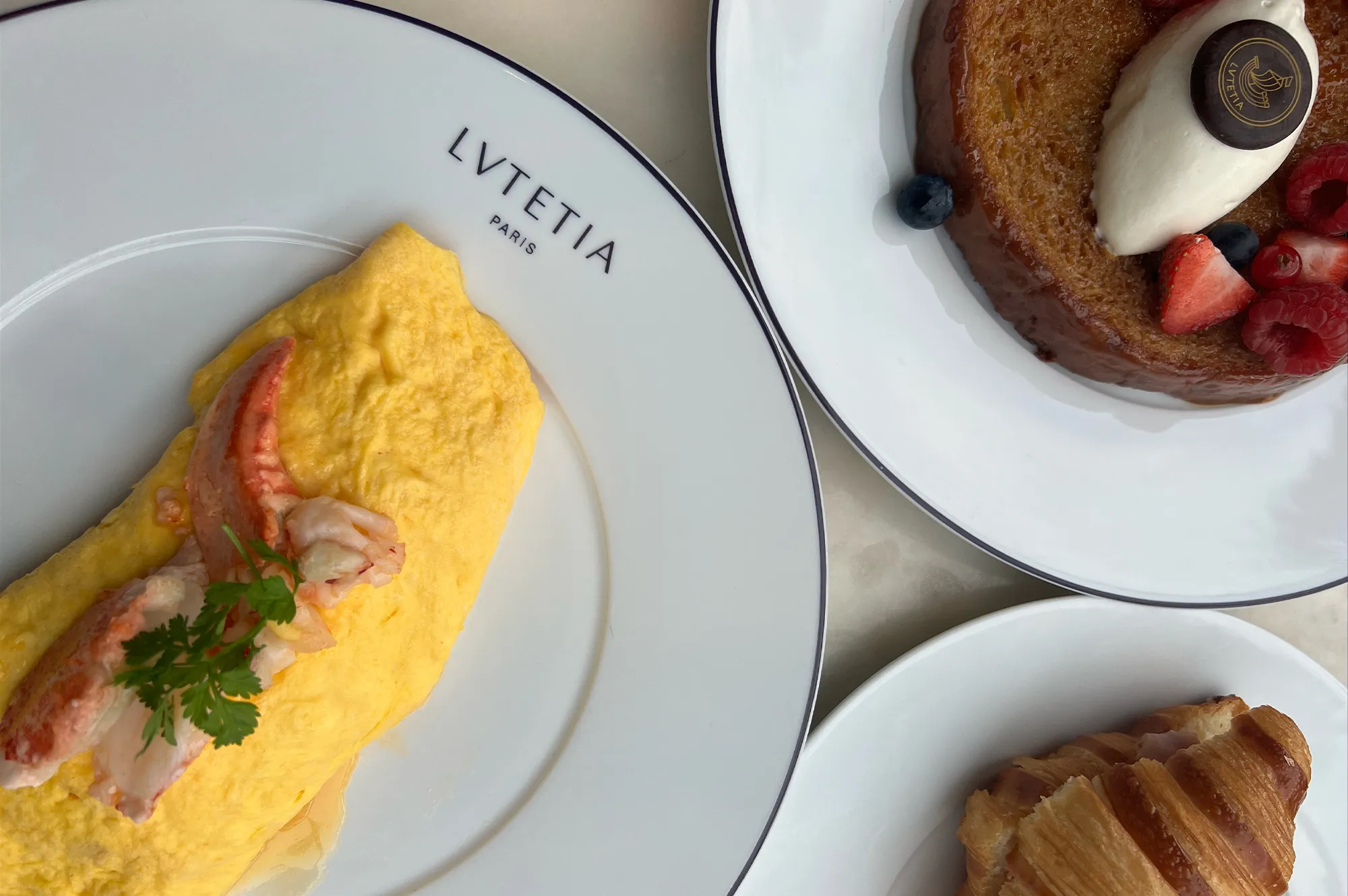 Gourmet lobster omelette and breakfast dishes served at Brasserie Lutetia.