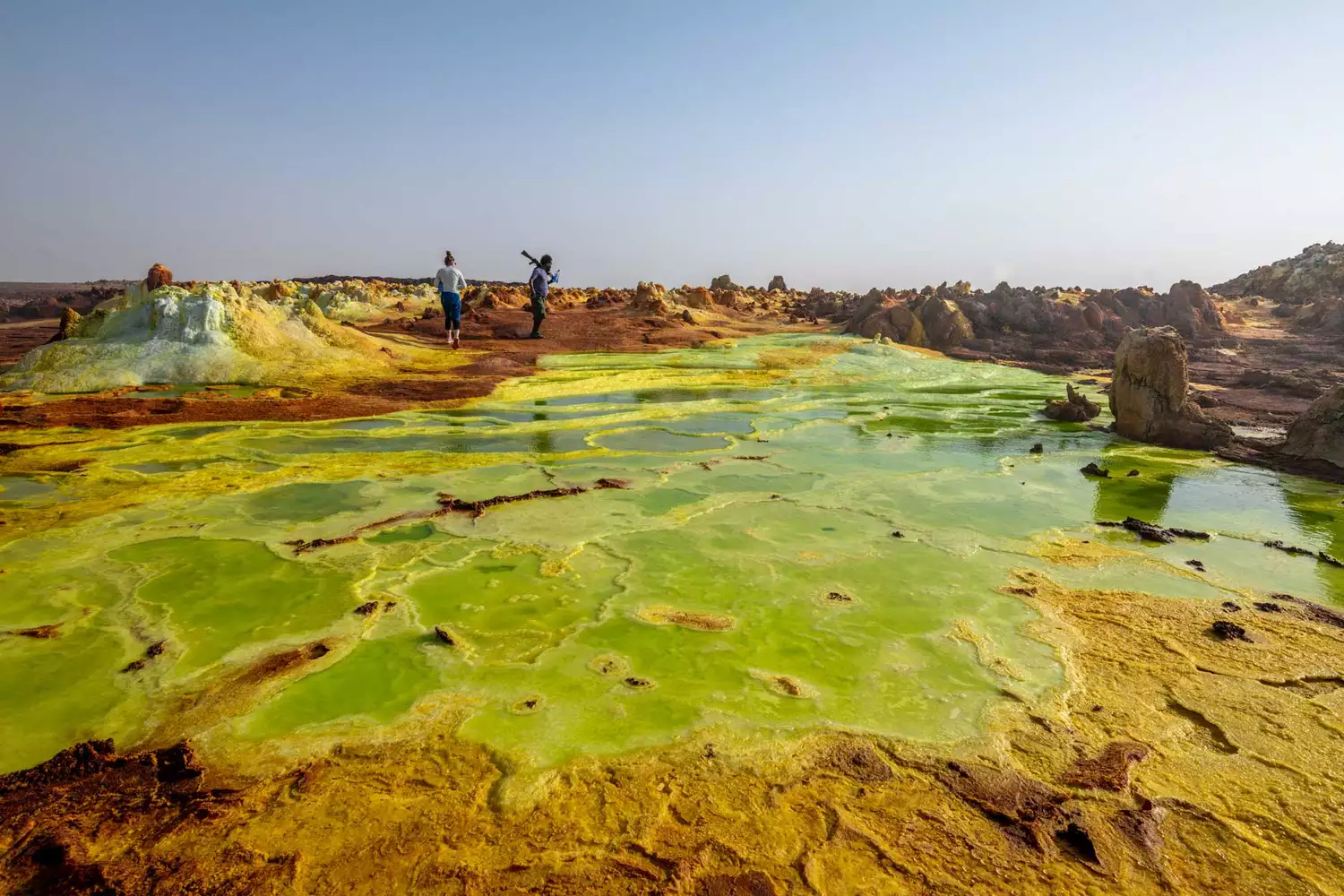 Brightly colored hydrothermal pools and salt formations in the Danakil Depression, Ethiopia.
