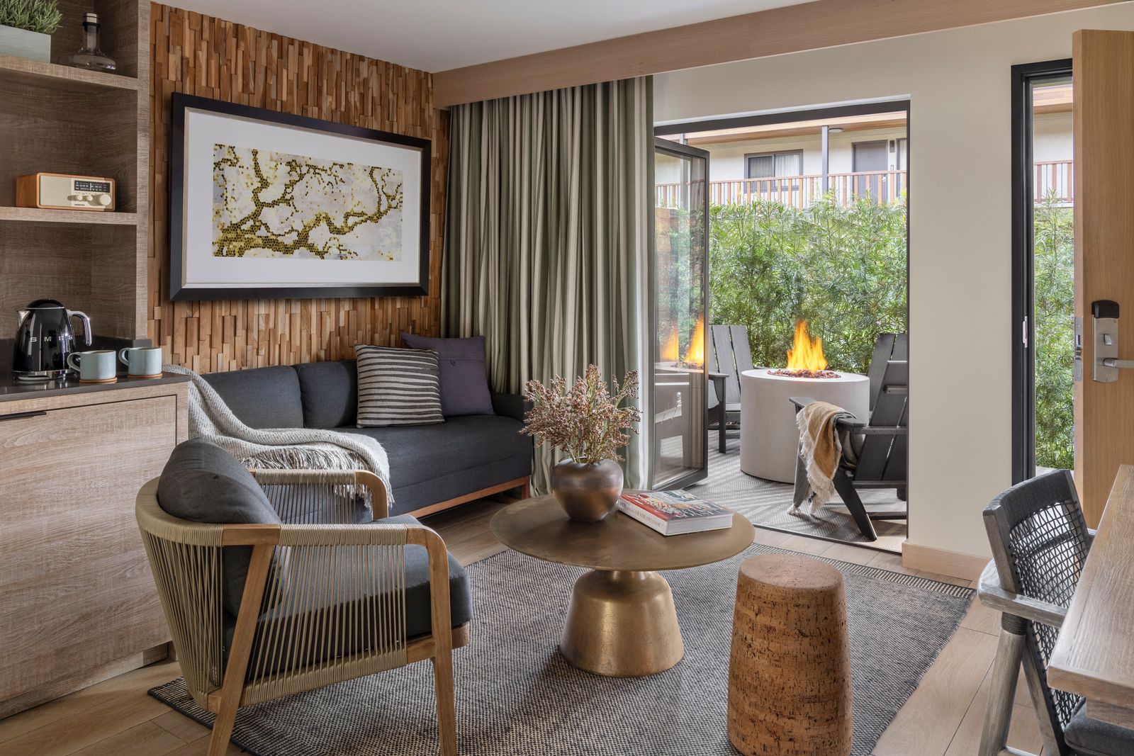 An interior space focused on books and architectural design, representing a curated travel lifestyle.