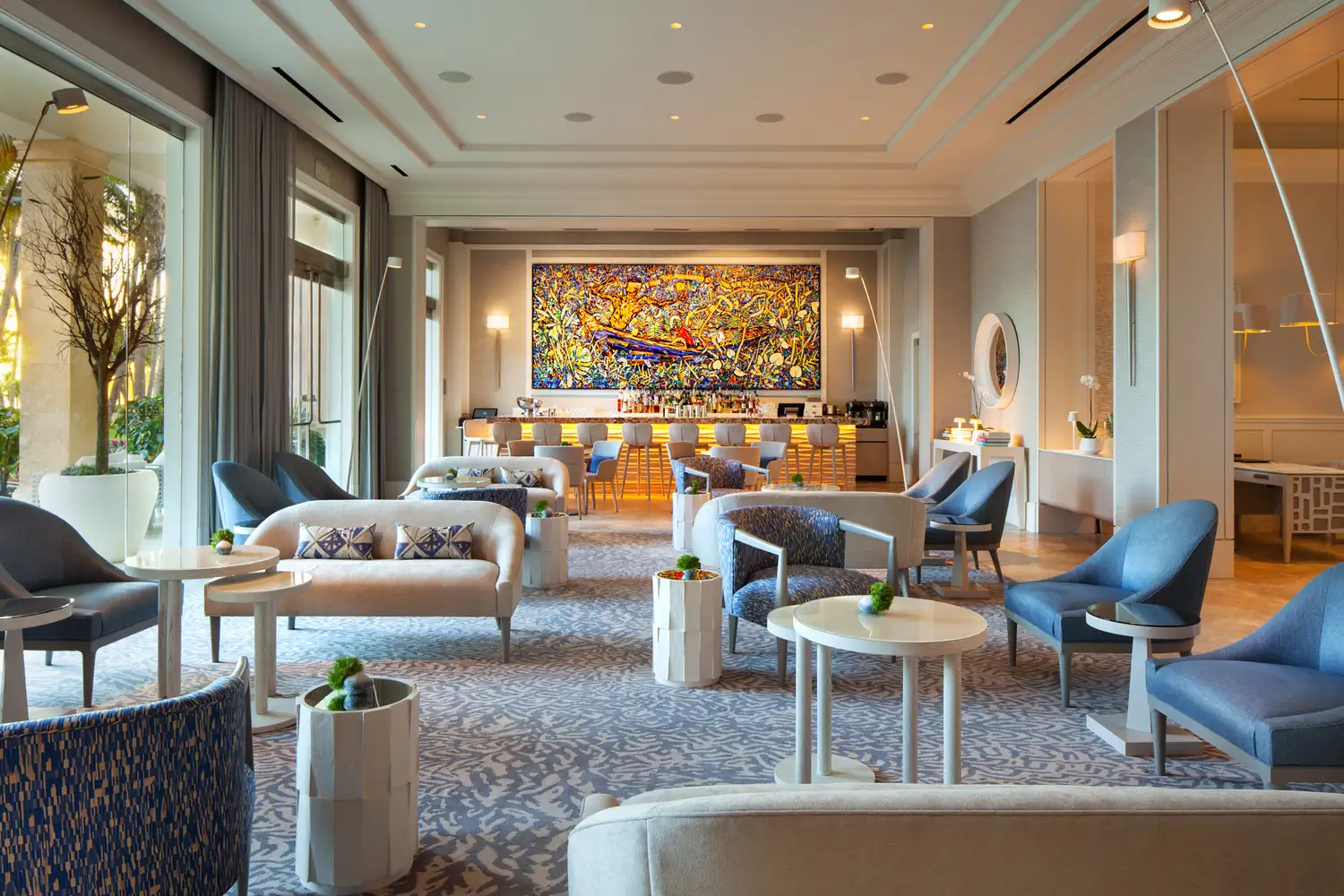 Modern lounge area with luxury seating at the St. Regis Bahia Beach Resort.