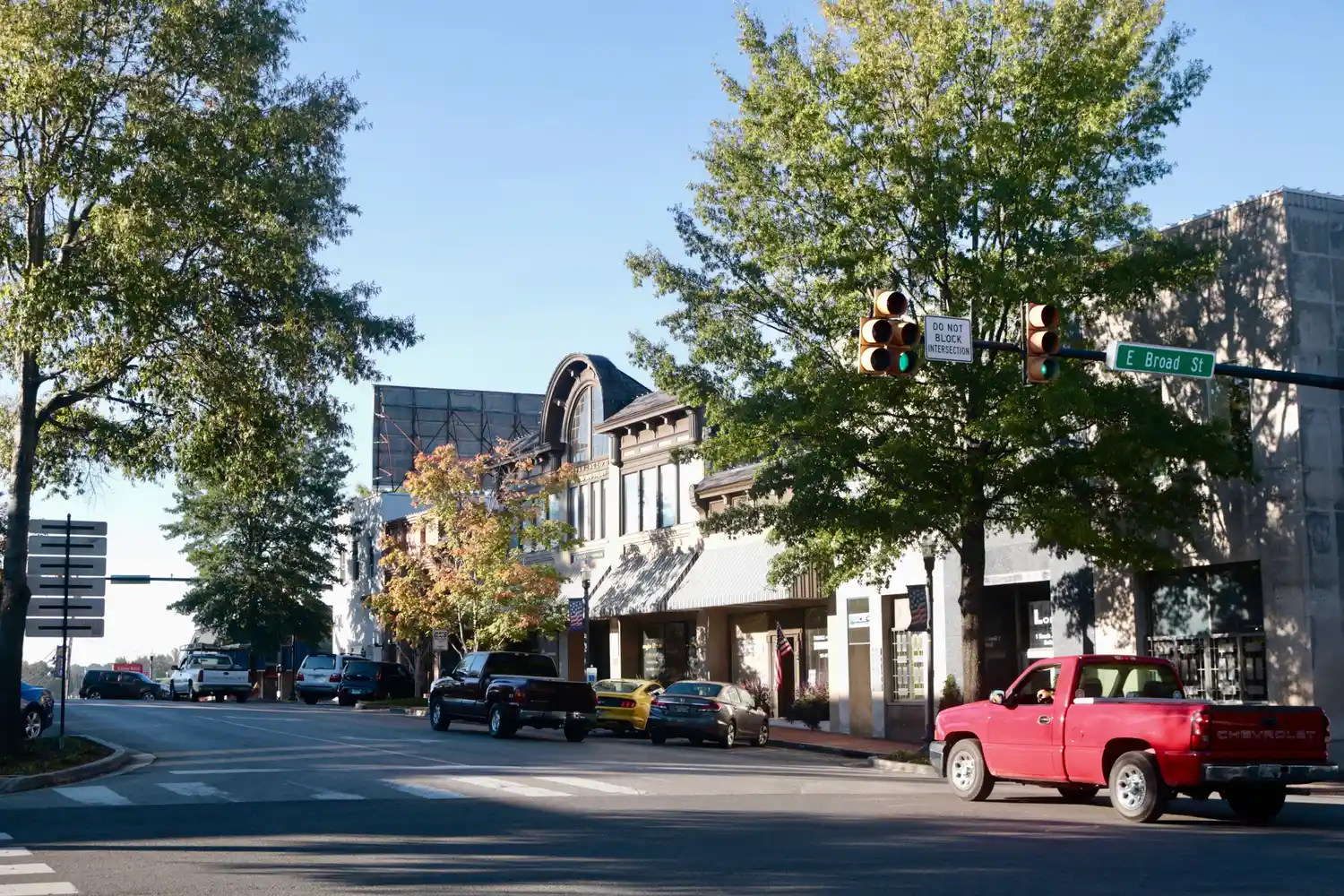 Perspective view down a historic Cookeville street with brick buildings and storefronts.