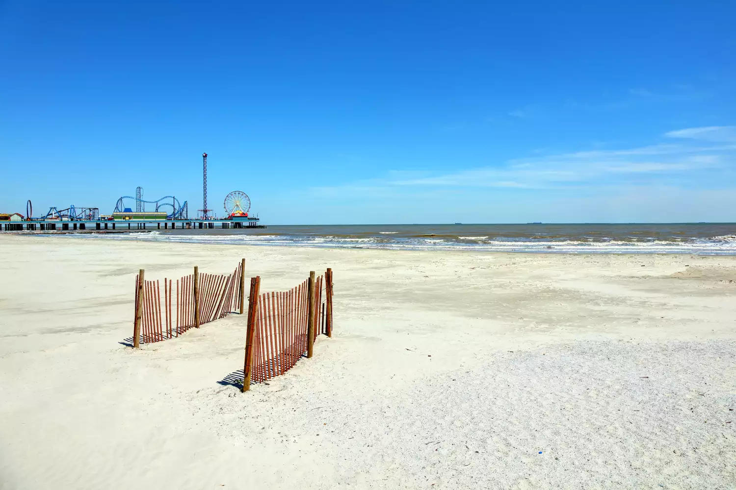 Stewart Beach on Galveston Island showing the sandy coastline and ocean waves.