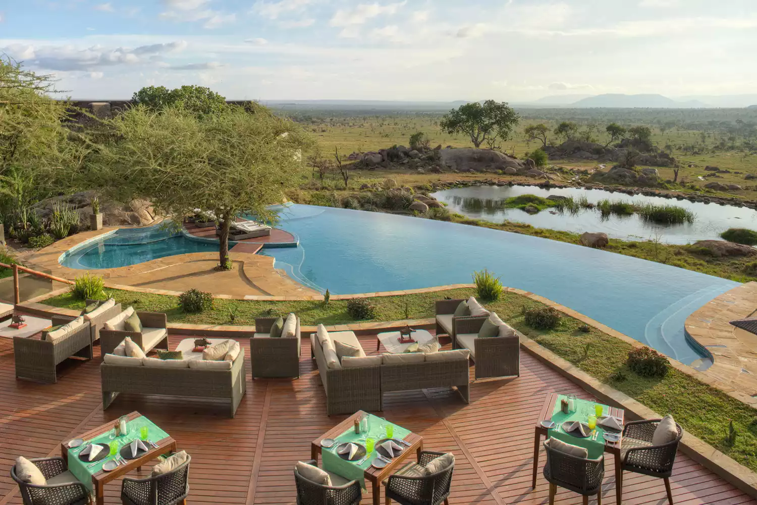 Aerial view of the Four Seasons Safari Lodge Serengeti showing the large pool and social dining decks.